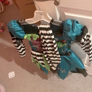I am selling a girls monster costume. Looks like Frankenstein.